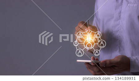 Young man hand using smartphone to Interconnect, Interconnected Concept; People connect via wireless internet in a world of digital technology and communications that connect freely around the world 134189931
