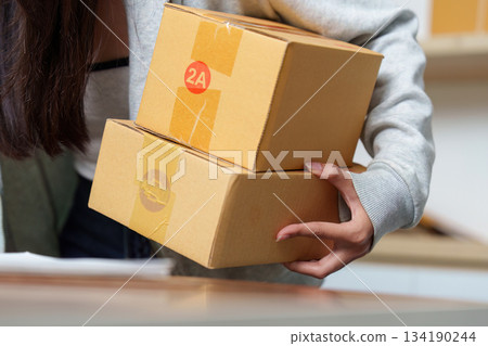 E-commerce: Carrying Multiple Packages for Delivery 134190244