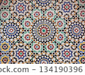 Moroccan Islamic mosaic tiles in Marrakesh, Morocco 134190396