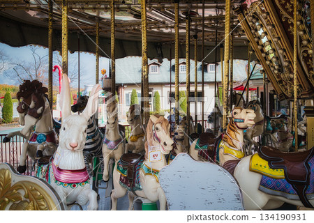 A fun merry-go-round at a retro amusement park A fun merry-go-round at a retro amusement park 134190931