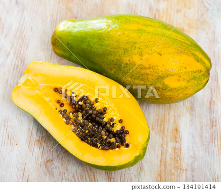 Papaya cut in half Papaya cut in half 134191414