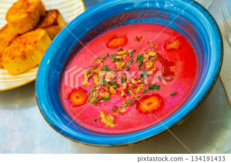 Beetroot salmorejo with nut and strawberry 134191433