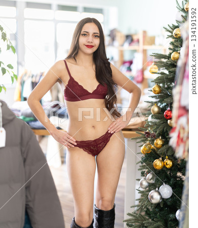 Young girl in underwear in selling area clothing store Young girl in underwear in selling area clothing store 134191592