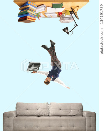 Dynamic collage businessman falling between upside down desk and sofa in remote work scene. 134191789