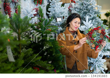Asian female shopping Christmas decorations Asian female shopping Christmas decorations 134191883