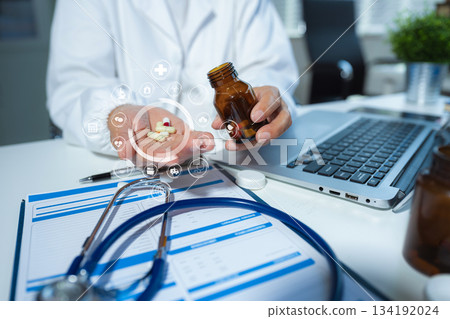 Medicine doctor hand working with modern digital tablet computer and smartphone interface as medical network concept. Medicine doctor hand working with modern digital tablet computer and smartphone interface as medical network concept. 134192024