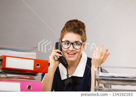 Happy secretary business woman in office Happy secretary business woman in office 134192163