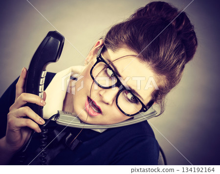 Sleepy business woman in office working Sleepy business woman in office working 134192164