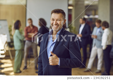 Banner with a group portrait of happy multiethnic people at a work meeting in the office Banner with a group portrait of happy multiethnic people at a work meeting in the office 134192251