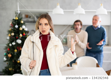 Men quarreling with girl 134192348