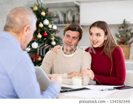 Agent making offer to couple 134192349