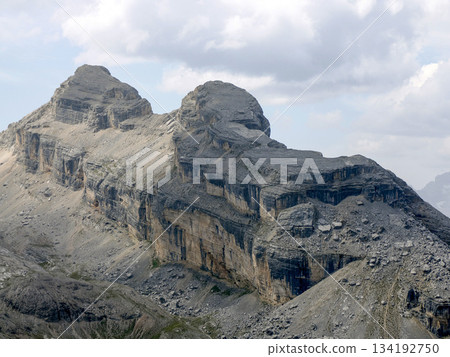Peaks of Dolomites mountains Fanes panorama in summer season landscape view from Col Bechei Peaks of Dolomites mountains Fanes panorama in summer season landscape view from Col Bechei 134192750
