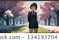 High school girl looking up at cherry blossoms 134193704
