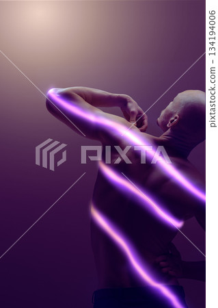 Modern artwork of male back shaped by flowing purple glowing lines. 134194006