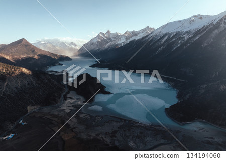 Aerial view of beautiful snow mountains and lake in Tibet,China Aerial view of beautiful snow mountains and lake in Tibet,China 134194060
