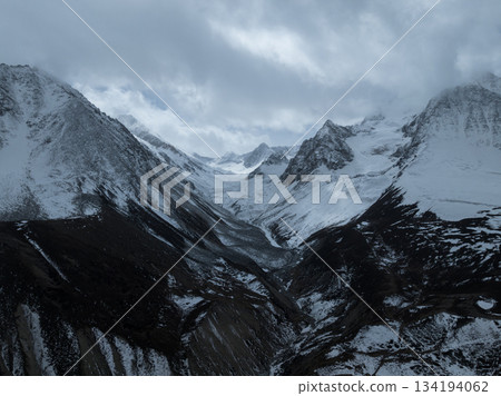 Beautiful high altitude snow capped mountain and forest  in Tibet, China 134194062