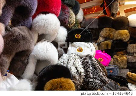 Russian souvenir hats-earflaps of different colors 134194643