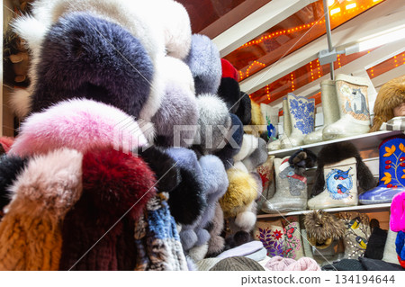 Russian souvenir hats-earflaps of different colors 134194644