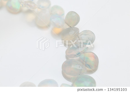 Ethiopian Opal Briolette | Natural opal material with soft, sparkling play of color 134195103