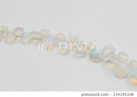 Ethiopian Opal Briolette | Natural opal material with soft, sparkling play of color 134195106