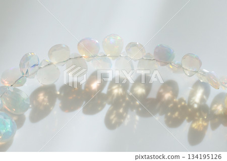 Ethiopian Opal Briolette | Natural opal material with soft, sparkling play of color 134195126