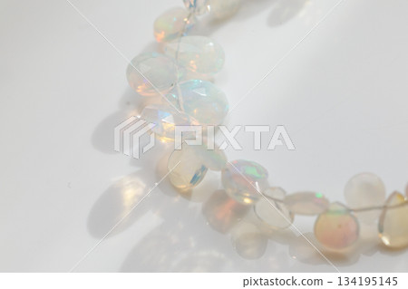 Ethiopian Opal Briolette | Natural opal material with soft, sparkling play of color 134195145