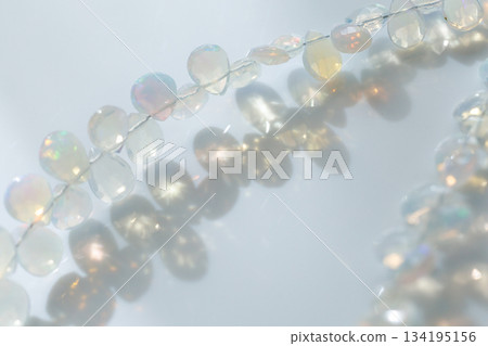 Ethiopian Opal Briolette | Natural opal material with soft, sparkling play of color 134195156