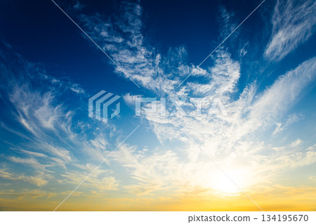 A dramatic landscape of blue sky, clouds and sunset A dramatic landscape of blue sky, clouds and sunset 134195670