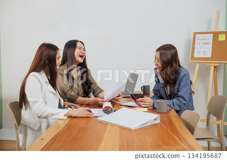 Busy office work women meet, team collaboration, people discussing project ideas in conference room, sharing insights for market success and future business planning. Busy office work women meet, team collaboration, people discussing project ideas in conference room, sharing insights for market success and future business planning. 134195687