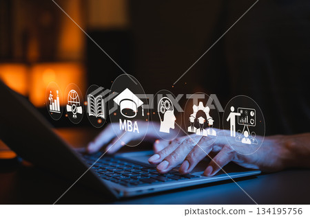 MBA Program Concept. Master of Business Administration. Businessman using laptop with MBA text and graduation cap icon, educational and professional development symbols representing business learning. MBA Program Concept. Master of Business Administration. Businessman using laptop with MBA text and graduation cap icon, educational and professional development symbols representing business learning. 134195756