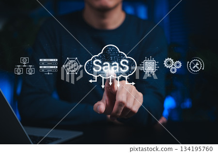 SaaS cloud computing and software service technology. Person interacts with SaaS cloud icons, represent Software as a Service, cloud infrastructure, data processing digital platform-based solutions SaaS cloud computing and software service technology. Person interacts with SaaS cloud icons, represent Software as a Service, cloud infrastructure, data processing digital platform-based solutions 134195760