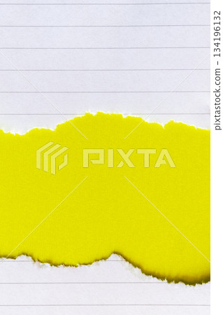 Ripped white paper with lined texture on a bright yellow background. The torn edge creates a contrast between the two colors. 134196132
