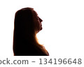 Silhouette of young woman looking up thoughtfully on white background 134196648