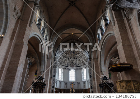 Interior view High Cathedral ceiling Saint Peter german Trier Dome. Architecture detail ornament sculptures angels saints ornate floral motifs radial composition. 134196755