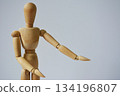 A drawing doll introducing something 134196807