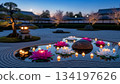 Zen garden at dusk with lotus flowers, candles, bonsai and lantern. Hanamatsuri celebration. 134197626