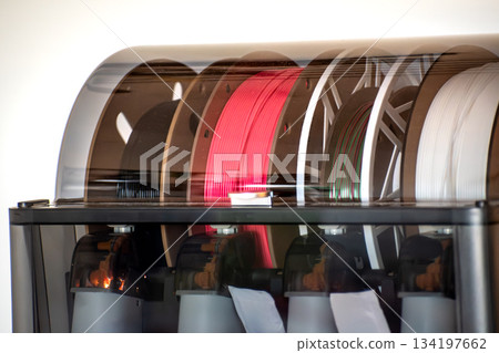 3d printer printing an object on the tray with pla filament, corn starch, non-waterproof filament 134197662