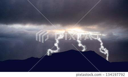 Dramatic landscape of a thunderstorm in the field. Tornadoes and strikes of lightning with a dark sky background. Extreme weather background 134197792