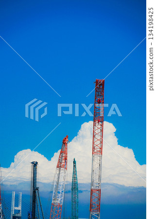 Summer sky and approach clouds and crane Summer sky and approach clouds and crane 134198425