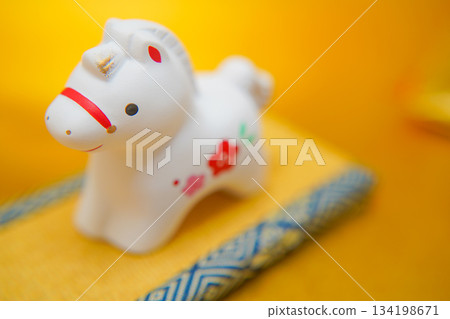 New Year's ornaments on a tatami stand with the zodiac sign of the horse 134198671