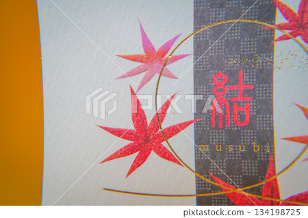 Japanese design of autumn leaves and knots Japanese design of autumn leaves and knots 134198725