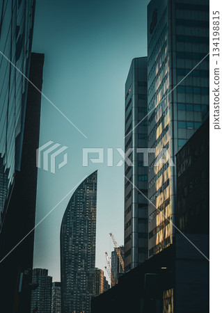 Curved towers floating above the city 134198815