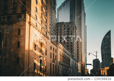 Stone building dyed in the morning sun (Toronto) 134198816