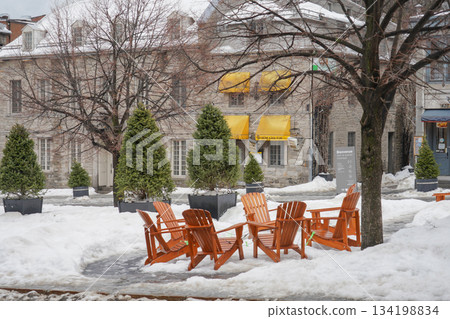 Snow-covered square and cafe area Snow-covered square and cafe area 134198834