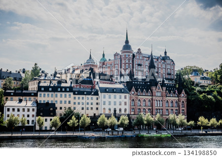 Stockholm Sweden panoramic view downtown and Gamla Stan Old Town over calm water 134198850
