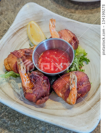 fried tempura shrimp on plate with sauce ready to eat 134199278