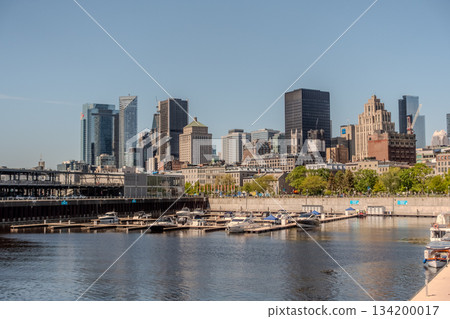Montreal city skyline panorama over river in the day with urban buildings 134200017
