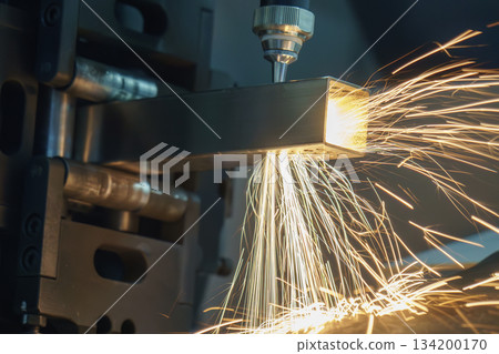 Close up scene the fiber laser cutting machine cut  the square stainless steel tube. 134200170