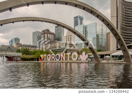 TORONTO, CANADA - May, 2025: View of Toronto Sign on Nathan Phillips Square, in Toronto, City Hall TORONTO, CANADA - May, 2025: View of Toronto Sign on Nathan Phillips Square, in Toronto, City Hall 134200442