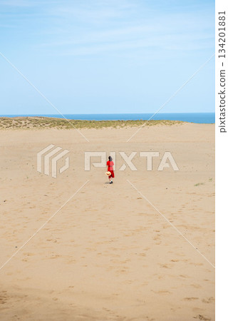 Woman at Tottori Sand Dunes 134201881